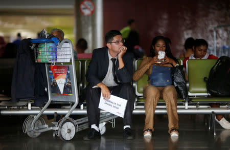 Cuban doctors return to their home, after criticism by Brazil's President-elect Jair Bolsonaro prompted Cuba's government to sever a cooperation agreement, in Brasilia, Brazil November 22, 2018. REUTERS/Adriano Machado