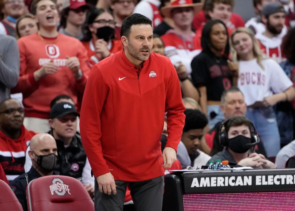 Ohio State Buckeyes assistant coach Ryan Pedon watches from the bench during the second half of the NCAA men's basketball game against the Michigan State Spartans at Value City Arena in Columbus on March 3, 2022. Ohio State won 80-69.