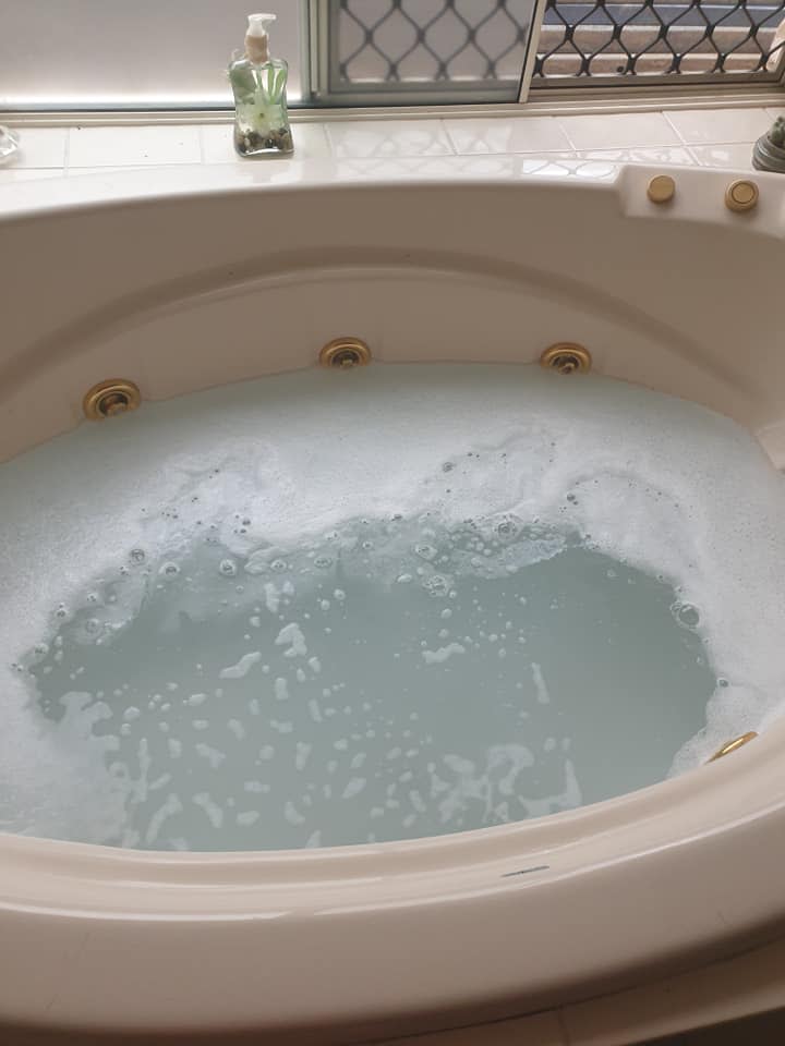 The bath was filled with products for a strip clean, and didn't looks as enticing after. Photo: Supplied