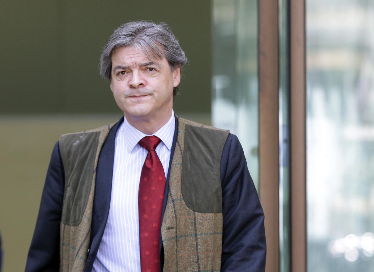 Rhodri Colwyn Philipps leave following a hearing at Westminster Magistrates Court in London, Tuesday, May 2, 2017. Philips also known by his aristocratic title Viscount St Davids is appearing on charges related to sending racially aggravated messages directed at Brexit court campaigner Gina Miller. Philipps is to go to trial in July. (AP Photo/Alastair Grant)