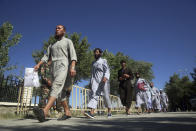 Afghan Taliban prisoners are released from Bagram Prison in Parwan province, Afghanistan, Tuesday, May 26, 2020.The Afghan government freed hundreds of prisoners, its single largest prisoner release since the U.S. and the Taliban signed a peace deal earlier this year that spells out an exchange of detainees between the warring sides. (AP Photo/ Rahmat Gul)