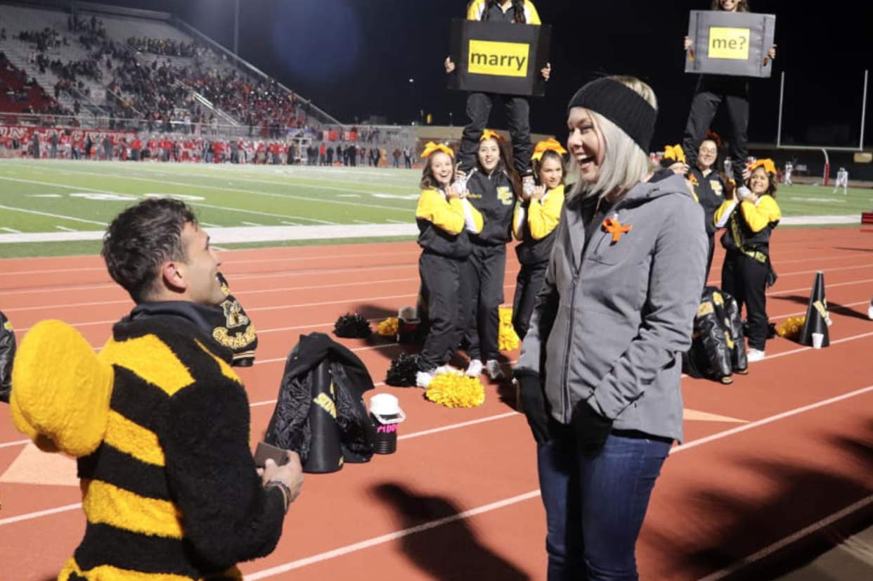 Jorge Gutierrez proposes to East Central High School's cheer coach, Natalie Earthman, with the help of the squad. (Photo: Natalie Earthman)