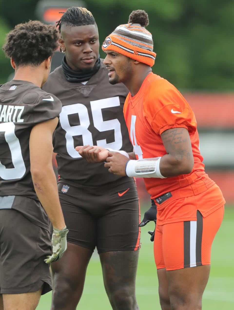 Cleveland Browns quarterback Deshaun Watson talks with Anthony Schwartz, left, and David Njoku during minicamp on Tuesday, June 14, 2022 in Berea.