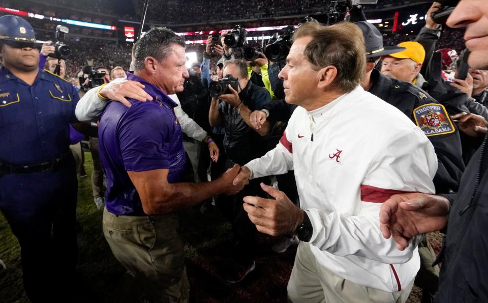 LSU Head Coach Ed Orgeron and Alabama Head Coach Nick Saban shake hands after the NCAA SEC football game between the Alabama Crimson Tide and the LSU Tigers at Bryant-Denny Stadium in Tuscaloosa, Ala on Saturday, Nov. 9, 2019. LSU won the game 46-41.
