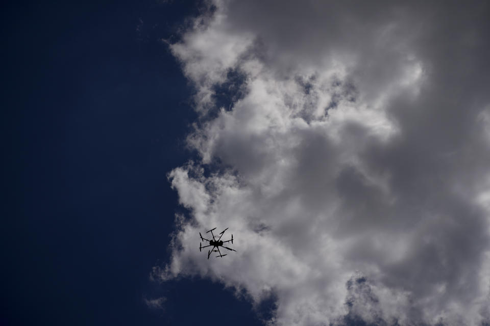 Vadym's drone flies in the outskirts of Kyiv, Ukraine, Wednesday, June 8, 2022. Never in the history of warfare have drones been used as intensively as in Ukraine, where they often play an outsized role in who lives and dies. Russians and Ukrainians alike depend heavily on unmanned aerial vehicles to pinpoint enemy positions and guide their hellish artillery strikes. (AP Photo/Natacha Pisarenko)