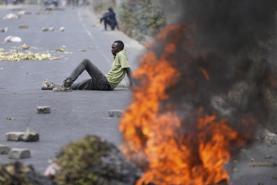 FILE - Protesters block the busy Nairobi - Mombasa highway in the Mlolongo area, Nairobi, Kenya, July 2, 2024. (AP Photo/Brian Inganga, file)