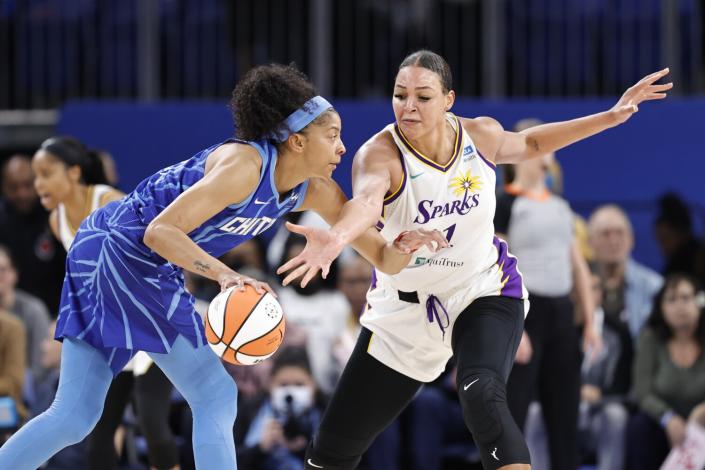 Chicago Sky forward Candace Parker, left, tries to work past Sparks center Liz Cambage during a game in May.