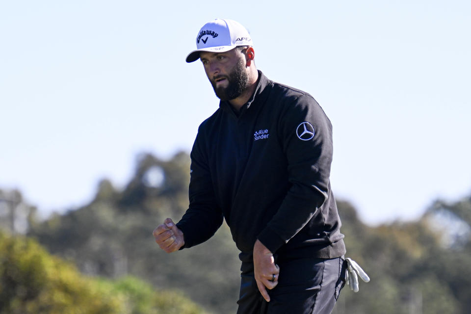 Jon Rahm, of Spain, pumps his fist after making a birdie putt on the eighth hole of the North Course at Torrey Pines during the second round of the Farmers Insurance Open golf tournament, Thursday, Jan. 26, 2023, in San Diego. (AP Photo/Denis Poroy)