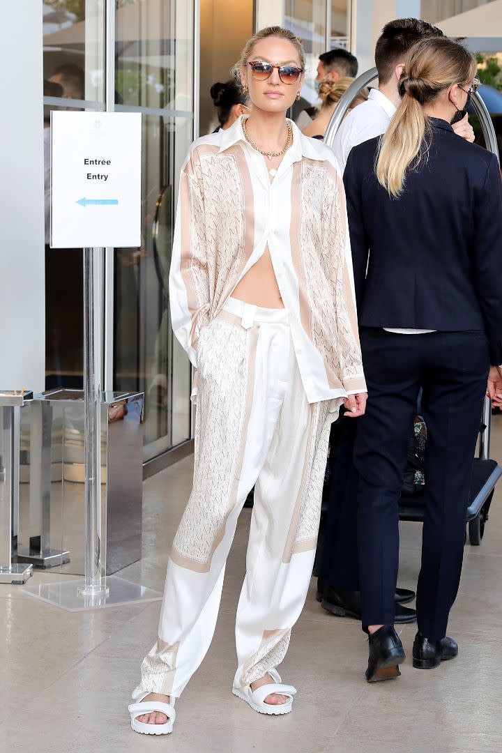 Candice Swanepoel seen at Hotel Martinez during Cannes Film Festival 2021, July 7. - Credit: MCvitanovic/Splash News