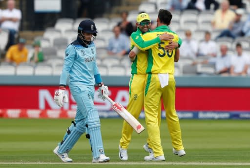 England's Joe Root makes his way back to the pavilion after being dismissed by Australia's Mitchell Starc