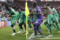 <p>Senegal players celebrate after beating Poland in their Group H opener </p>