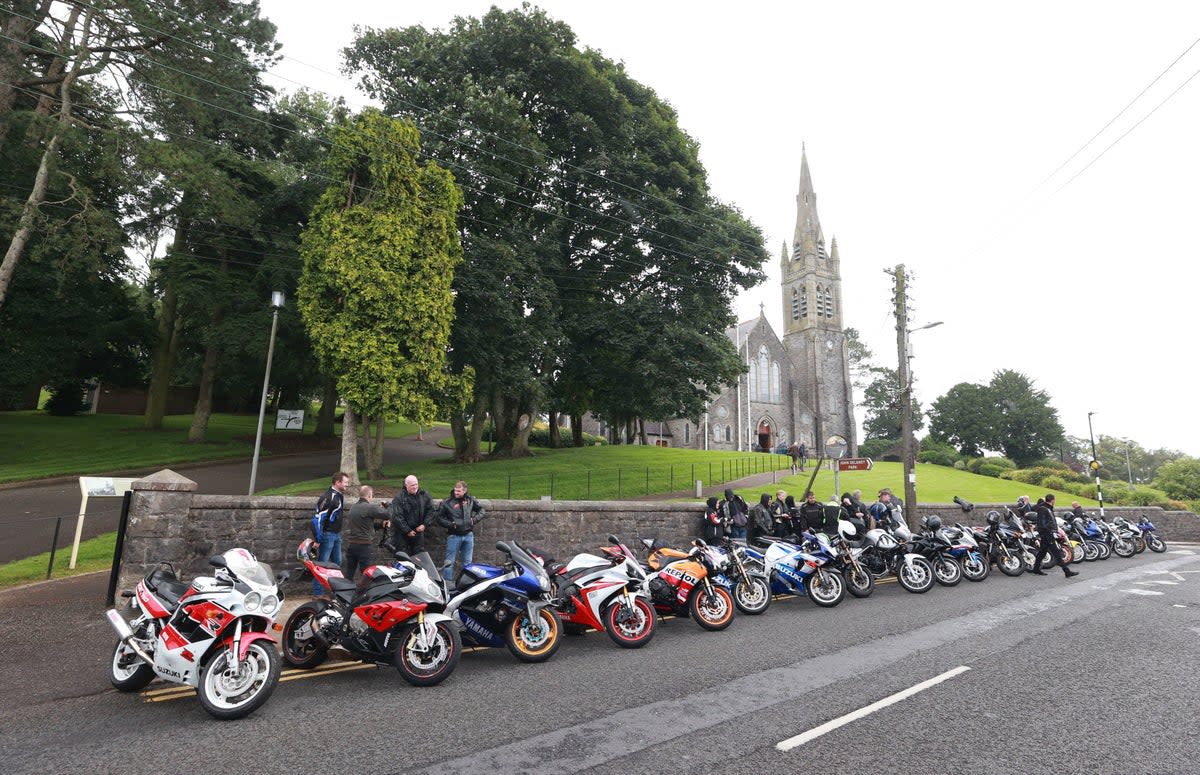 Motorcycle riders and local motorcycle club members outside the Sacred Heart Chapel (PA)