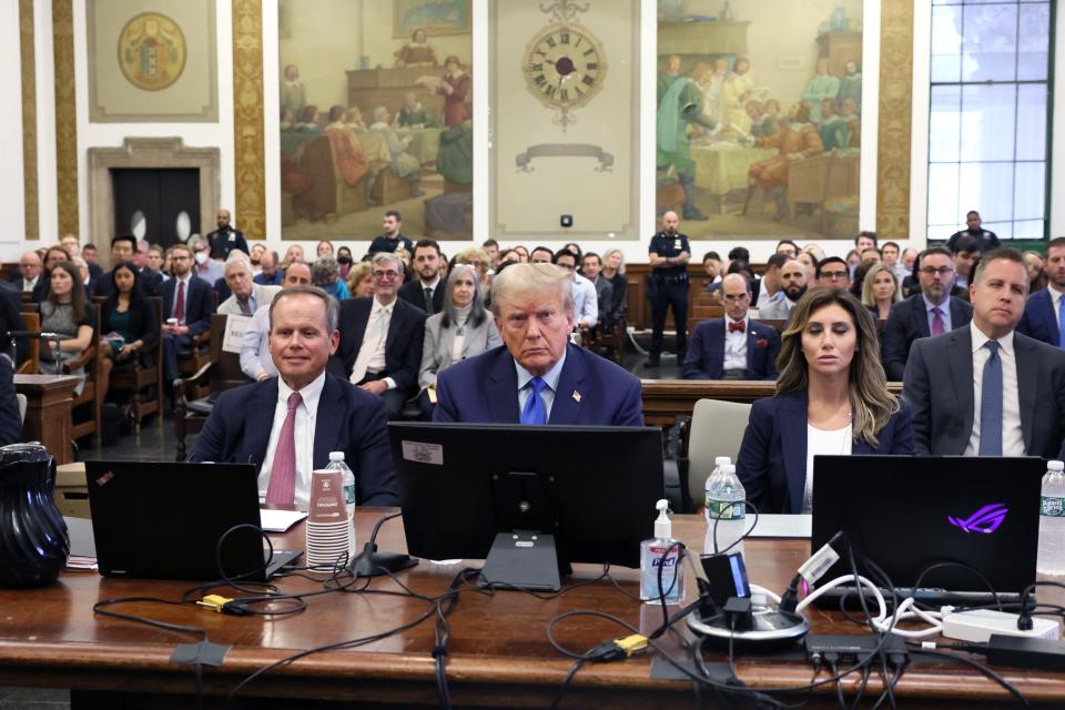 NEW YORK, NEW YORK - OCTOBER 02: Former U.S. President Donald Trump appears in the courtroom with his lawyers for the start of his civil fraud trial at New York State Supreme Court on October 02, 2023 in New York City. Former President Trump may be forced to sell off his properties after Justice Arthur Engoron canceled his business certificates and ruled that he committed fraud for years while building his real estate empire after being sued by Attorney General Letitia James, who is seeking $250 million in damages. The trial will determine how much he and his companies will be penalized for the fraud. (Photo by Brendan McDermid-Pool/Getty Images) *** BESTPIX *** ORG XMIT: 776042630 ORIG FILE ID: 1713382660