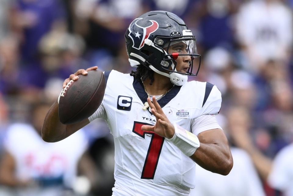 Houston Texans' C.J. Stroud thorws during the first half of an NFL football game against the Baltimore Ravens Sunday, Sept. 10, 2023, in Baltimore. (AP Photo/Nick Wass)