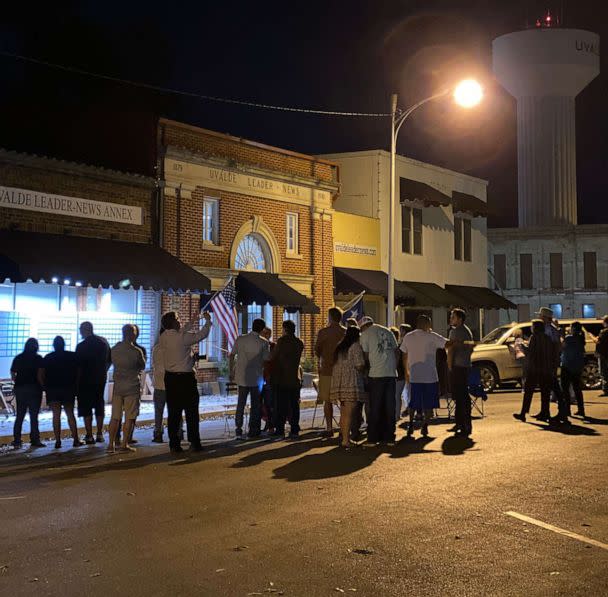 PHOTO: Community members gather outside the Uvalde Leader-News on election night in Uvalde, Texas, Nov. 8, 2022. (Hannah Prince/ABC News)