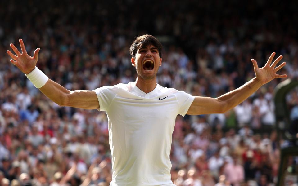 Carlos Alcaraz celebrates beating Novak Djokovic at Wimbledon