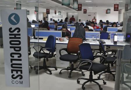 Employees of Shopclues.com, an online marketplace, work inside their office in Gurgaon, on the outskirts of New Delhi, India, January 19, 2016. REUTERS/Anindito Mukherjee