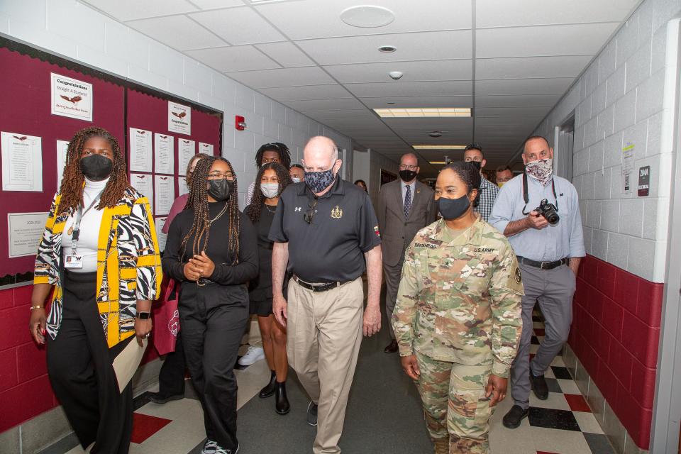 Gov. Larry Hogan tours Snow Hill High School on May 28, 2021. At left is principal Kim Purvis and right is Brig. Gen. Janeen Birckhead.