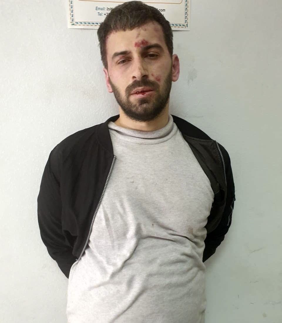 This Monday, April 19, 2021 photo provided by the Albanian Police shows Rudolf Nikolli, 34, after his arrest in Tirana, Albania. The Albanian young man has attacked with a knife and injured five persons at a mosque in the capital Tirana, according to police. A statement on Monday said that at about 2.30 p.m. (1230 GMT) Rudolf Nikolli, 34, entered the Dine Hoxha mosque downtown Tirana and "in unclear situation he injured with a knife 5 citizens." Police forces reacted immediately and managed to "neutralize him" but have yet to disclose the cause of the attack. (Albanian Police via AP)