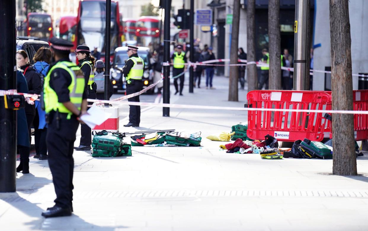 Police officers on Bishopsgate after stabbings - Pair who stabbed City workers in 'rampage to steal as many phones as possible' jailed