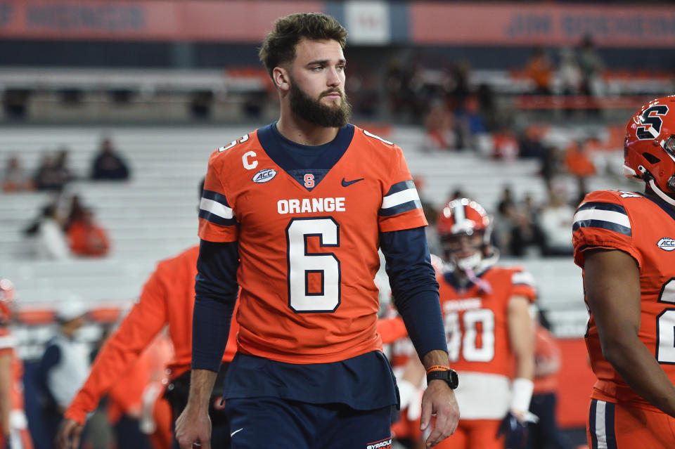 Syracuse quarterback Garrett Shrader watches warmups before the team's NCAA college football game against Boston College in Syracuse, N.Y., Friday, Nov. 3, 2023. (AP Photo/Adrian Kraus)