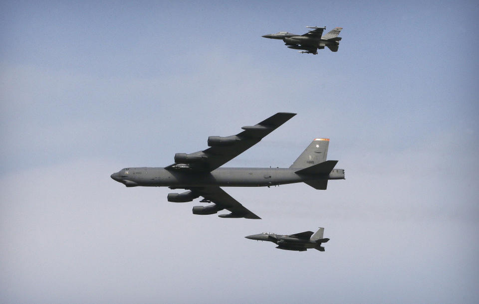 FILE - A U.S. Air Force B-52 bomber flies over Osan Air Base in Pyeongtaek, South Korea, on Jan. 10, 2016. The United States flew nuclear-capable bombers and advanced stealth jets near the Korean Peninsula for joint drills with South Korean warplanes on Tuesday, Dec. 20, 2022 as the powerful sister of North Korean leader Kim Jong Un derided doubts about her country's military and threatened a full-range intercontinental ballistic missile test.(AP Photo/Ahn Young-joon, File)