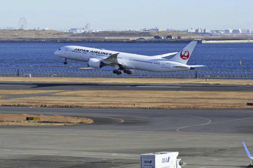 A Japan Airlines plane takes off at Haneda airport in Tokyo Monday, Jan. 8, 2024. Tokyo’s Haneda airport is almost back to its normal operation Monday as it reopened the runway a week after a fatal collision between a Japan Airlines airliner and a coast guard aircraft seen to have been caused by human error. (Kyodo News via AP)