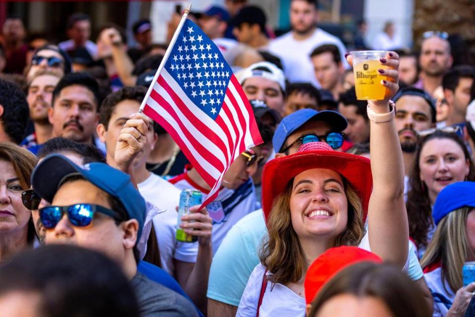 USA and England soccer fans watch during the first half of the 2022 World Cup Qatar at Fritz & Franz Bierhaus in Coral, Florida, on Friday, November 25, 2022.