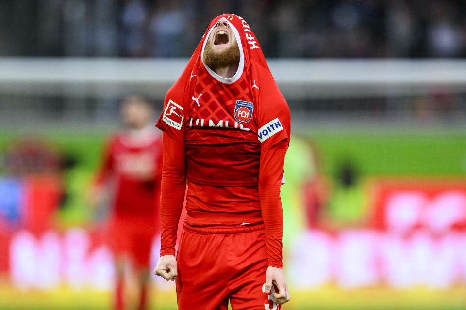 Heidenheim's Jan-Niklas Beste reacts after the Bundesliga soccer match between 1. FC Heidenheim and Borussia Moenchengladbach in Heidenheim, Germany, Saturday, March 16, 2024. (Tom Weller/dpa via AP)