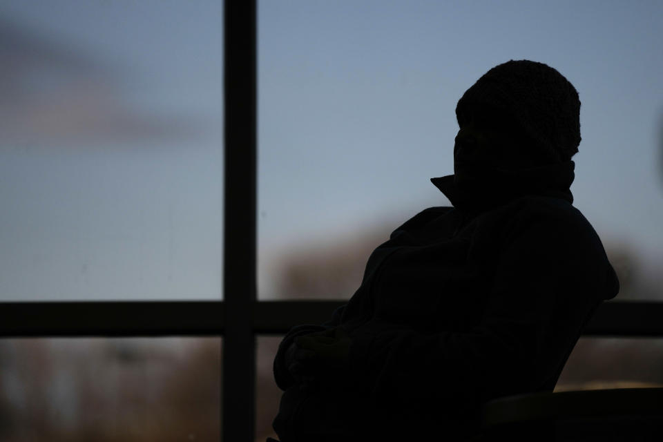 An audience member listens to a speak during an Iowa Migrant Movement for Justice informational meeting, Wednesday, March 27, 2024, in Des Moines, Iowa. A bill in Iowa that would allow the state to arrest and deport some migrants is stoking anxiety among immigrant communities about how it would be interpreted and enforced. (AP Photo/Charlie Neibergall)