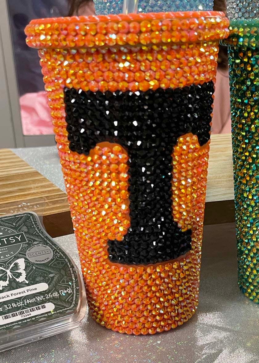 Haylee Maniaci started her bedazzling three weeks ago, spending up to five hours working on a cup honoring UT.