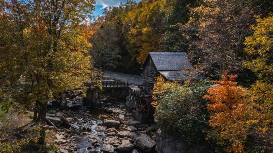 Grist Mill at New River Gorge National Park is surrounded by a tapestry of colors in fall.