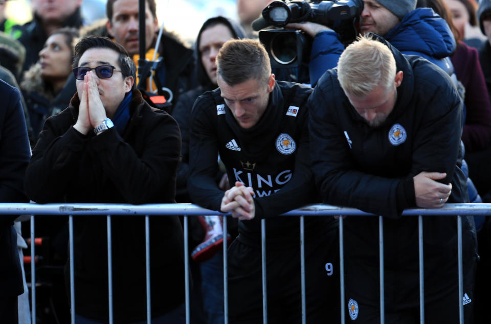 <p>Jamie Vardy and Kasper Schmeichel pay their respects to the Leicester City owner </p>