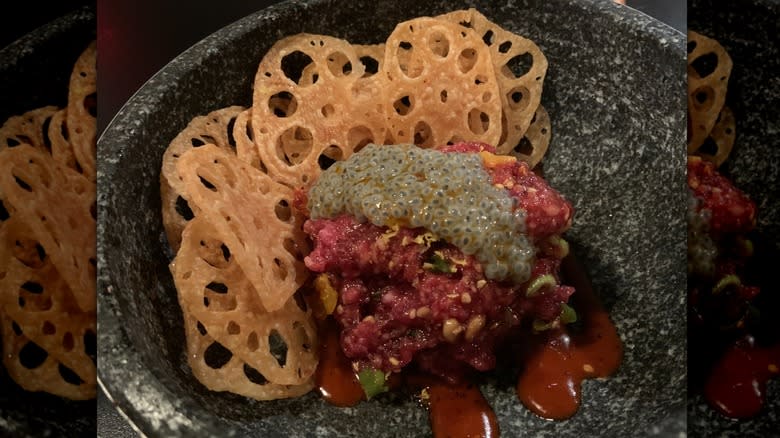 Beef tartar with lotus crisps