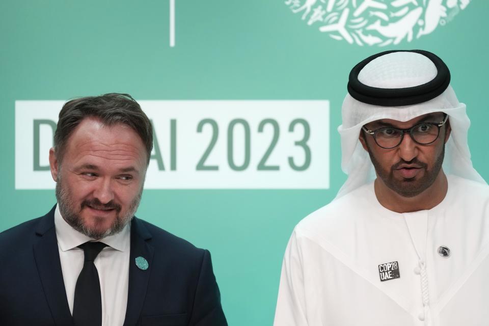 Denmark's Minister for Climate Dan Jorgensen, left, and COP28 President Sultan al-Jaber attend a news conference at the COP28 U.N. Climate Summit, Friday, Dec. 8, 2023, in Dubai, United Arab Emirates. (AP Photo/Peter Dejong)