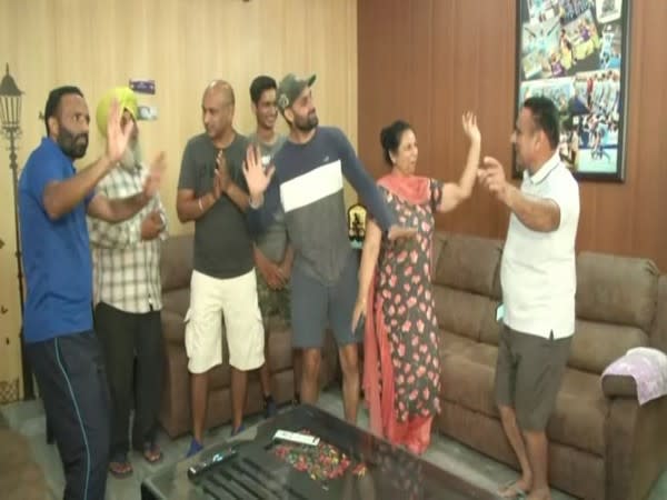 Hockey player Mandeep Singh's family celebrating India's win at Tokyo Olympics. (Photos/ANI) 