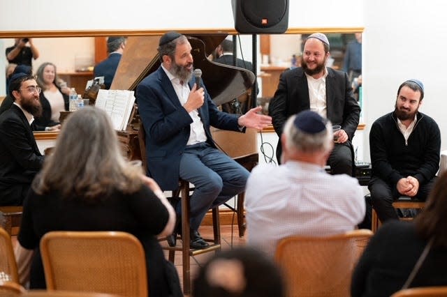 Rabbis Shneor Minsky, from left, Moshe Scheiner, Yosef Rice and Leibel Shmotkin of Palm Beach Synagogue, shown at a musical event this summer, will travel to Israel on Sunday to support those affected by the Oct. 7 Hamas attacks.