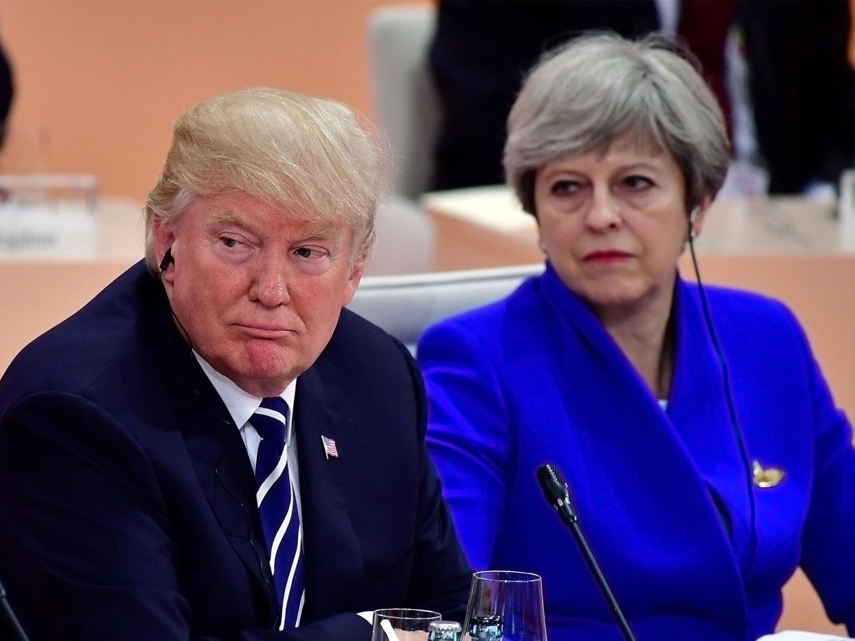 Donald Trump and Theresa May pictured during the first working session of the G20 Nations Summit in Hamburg in July 2017: Getty