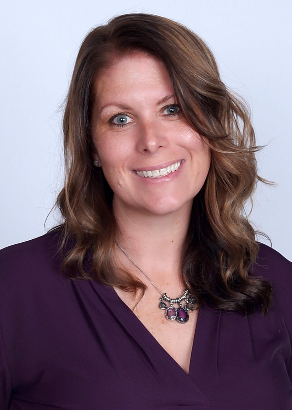 Smiling headshot of Amanda Flynn.