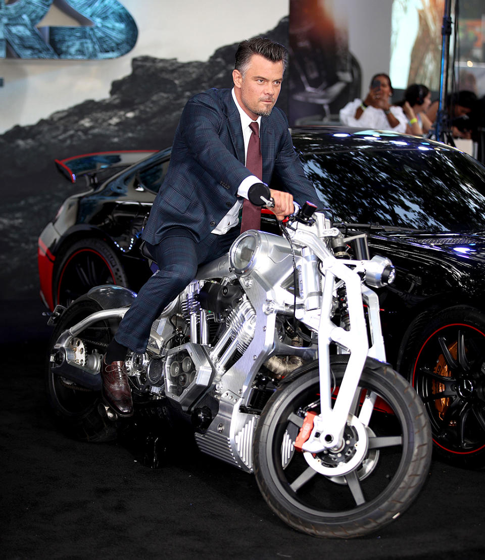 <p>The dashing star of <i>Transformers: The Last Knight</i> posed with some hot wheels at the movie’s London premiere. See, this is his dangerous look… (Photo: Mike Marsland/Mike Marsland) </p>