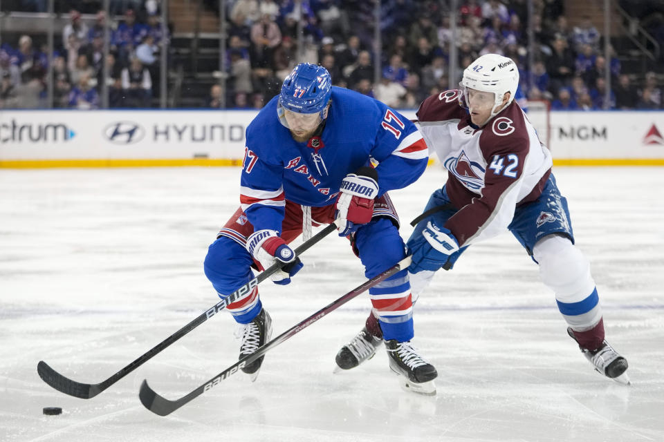 New York Rangers right wing Blake Wheeler (17) skates against Colorado Avalanche defenseman Josh Manson (42) during the second period of an NHL hockey game, Monday, Feb. 5, 2024, at Madison Square Garden in New York. (AP Photo/Mary Altaffer)