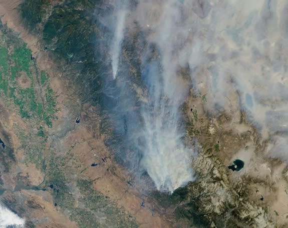 Visible image of California’s Rim Fire acquired Aug. 23, 2013 by the Multi-angle Imaging SpectroRadiometer (MISR) instrument on NASA’s Terra spacecraft, showing extensive, brownish smoke. The imaged area measures 236 by 215 miles (380 by 346 ki