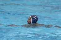 U.S. Olympic Water Polo Team attacker Max Irving trains for the Paris Olympics, at Mt. San Antonio College in Walnut, Calif., on Wednesday, Jan. 17, 2024. Irving's father, Michael Irving, is a Pac-12 college basketball referee. Max Irving is also the only Black man on the U.S. Olympic Water Polo Team and a prominent advocate for diversity in the sport. (AP Photo/Damian Dovarganes)