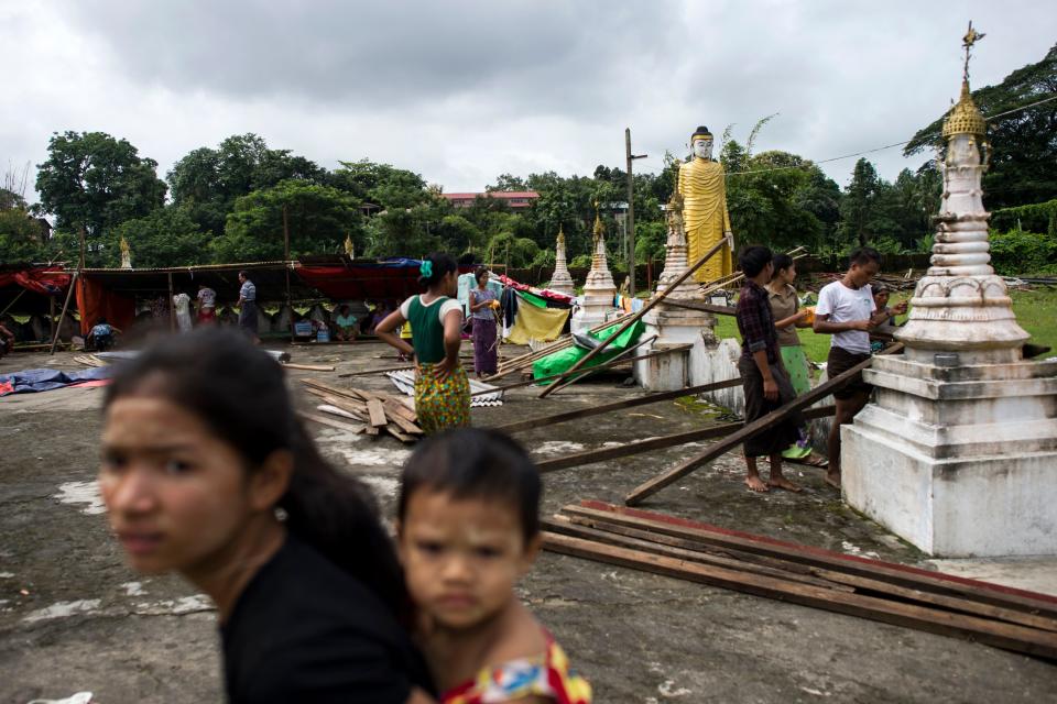 <p>Flood victims take shelter at a temple compound in Taungnu township of Bago region in Myanmar on Aug. 31, 2018. (Photo: Ye Aung Thu/AFP/Getty Images) </p>