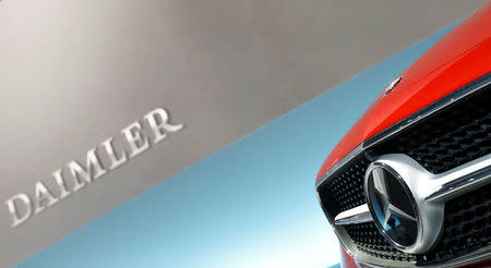 FILE PHOTO: The Mercedes star logo of an E Coupe is pictured before the annual news conference of Daimler AG in Stuttgart, Germany, February 2, 2017. REUTERS/Michaela Rehle/File Photo