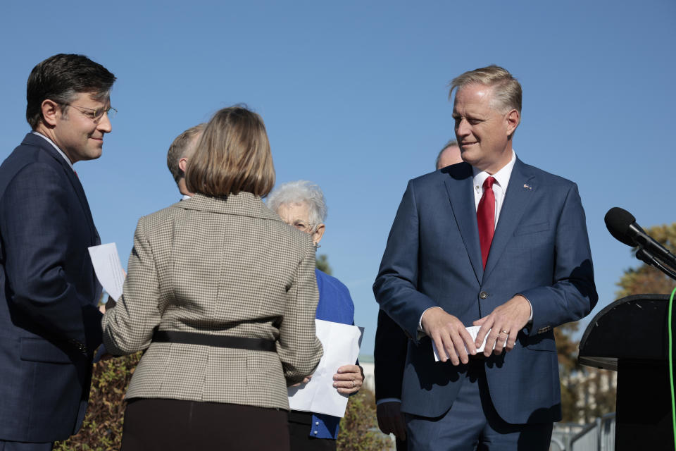 WASHINGTON, DC - NOVEMBER 18: Rep. Fred Keller (R-PA) looks back to fellow House Republicans including Rep. Mike Johnson (R-LA) (L) before the start of a press conference on vaccine mandate for businesses on November 18, 2021 in Washington, DC. Keller is introducing legislation to formally disapprove of and nullify President Biden’s vaccine mandate for federal employers. (Photo by Anna Moneymaker/Getty Images)