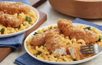 <p>Everyone could use a time-saving meal, and by using a box of mac and cheese as a base, you can spend more time <a href="https://www.thedailymeal.com/cook/35-chicken-recipes-busy-weeknights-0?referrer=yahoo&category=beauty_food&include_utm=1&utm_medium=referral&utm_source=yahoo&utm_campaign=feed" rel="nofollow noopener" target="_blank" data-ylk="slk:cooking the chicken to perfection;elm:context_link;itc:0;sec:content-canvas" class="link ">cooking the chicken to perfection</a>.</p> <p><a href="https://www.thedailymeal.com/recipes/crispy-chicken-mac-and-cheese-recipe?referrer=yahoo&category=beauty_food&include_utm=1&utm_medium=referral&utm_source=yahoo&utm_campaign=feed" rel="nofollow noopener" target="_blank" data-ylk="slk:For the Crispy Chicken Mac and Cheese recipe, click here.;elm:context_link;itc:0;sec:content-canvas" class="link ">For the Crispy Chicken Mac and Cheese recipe, click here.</a></p>  