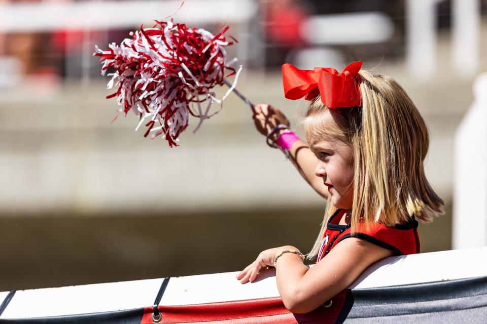 A young Utah Utes fan cheers during the football game against the Weber State Wildcats at Rice-Eccles Stadium in Salt Lake City on Saturday, Sept. 16, 2023. | Megan Nielsen, Deseret News