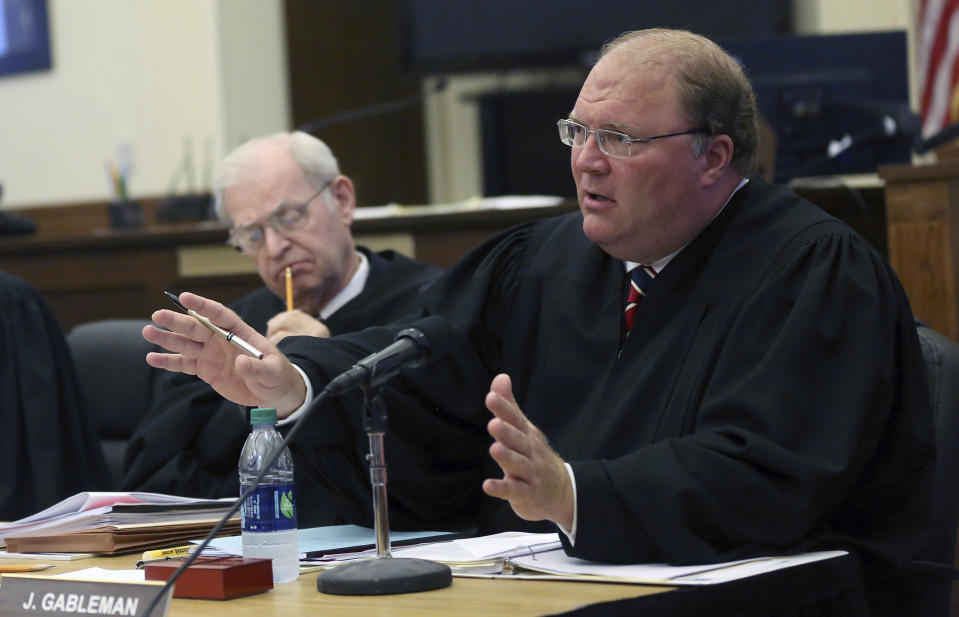 FILE- In this Sept. 17, 2015 file photo, then Wisconsin Supreme Court Justice Michael J. Gableman speaks during a court hearing at the Grant County Courthouse in Lancaster, Wis. Wisconsin Attorney General Josh Kaul asked a court to block subpoenas issued by an attorney hired by Republicans to lead an investigation into the 2020 presidential election that was won by President Joe Biden. Kaul, a Democrat, asked a Dane County judge on Thursday to block the subpoenas sent to state elections officials by former Wisconsin Supreme Court Justice Michael Gableman. He was hired to look into the election by Republican Assembly Speaker Robin Vos. (Jessica Reilly/Telegraph Herald via AP, File)