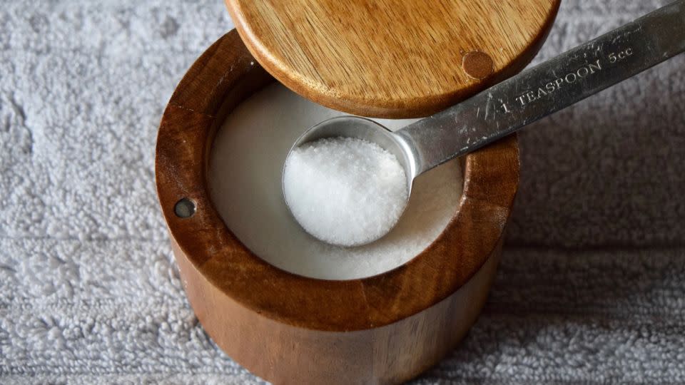 One way to cut a teaspoon of salt from your diet is by reading labels since many foods have added salt, experts say. - Wirestock/iStockphoto/Getty Images